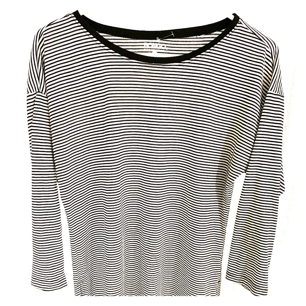 Tunic length black and white stripped top.